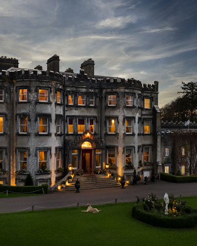 Evening exterior view of the ballyseede castle estate and hotel in kerry