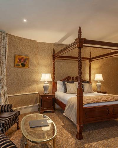 Four post bed in elegant castle hotel suite