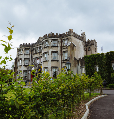 View of the ballyseede castle from the country estate gardens in ireland