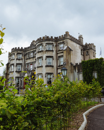 View of the ballyseede castle from the country estate gardens in ireland