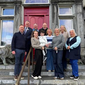 Ballyseede castle staff posing for photo outside hotel