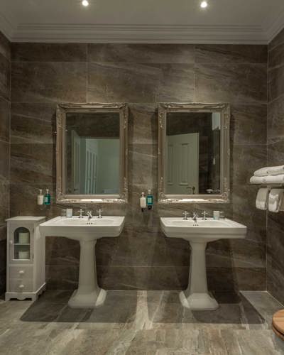 Twin basins in luxury 4 star hotel room bathroom in ireland