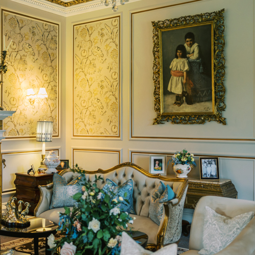 Luxury hotel drawing room with white sofas and chendlier in ireland