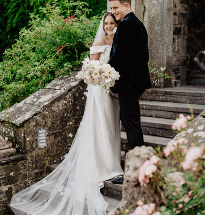 Couple smile for photos on their wedding day at irish castle