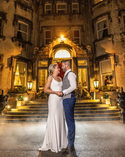 Newlywed couple at night outside the ballyseede hotel